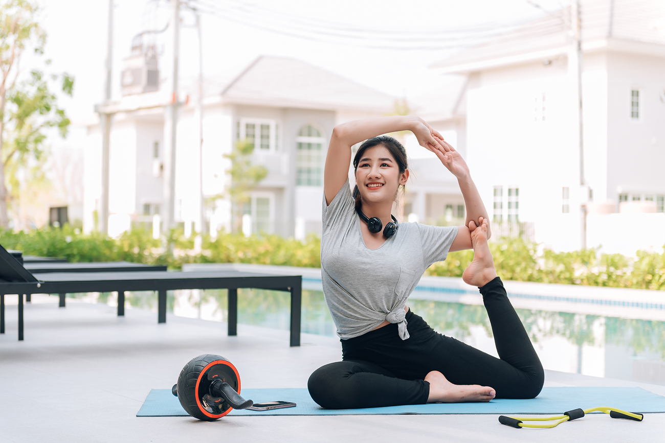 woman exercising and stretching for a healthier lifestyle