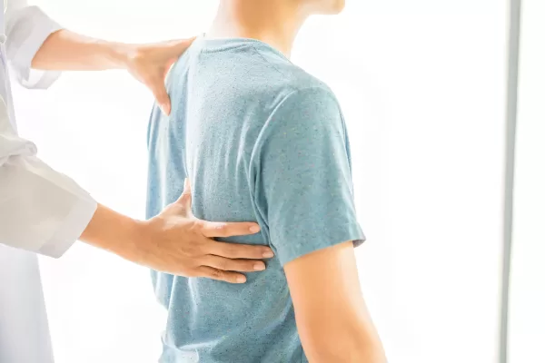 close-up-physiotherapist-working-with-patient-clinic